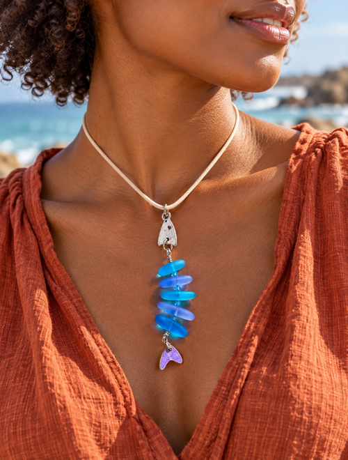 Blue & purple Bonefish Sea glass necklace worn by a model